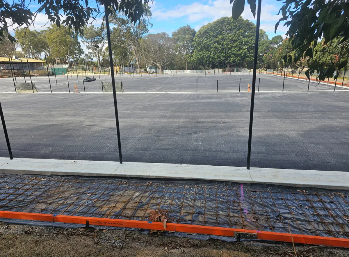New court base and fencing posts at Elliot Park, September 2026