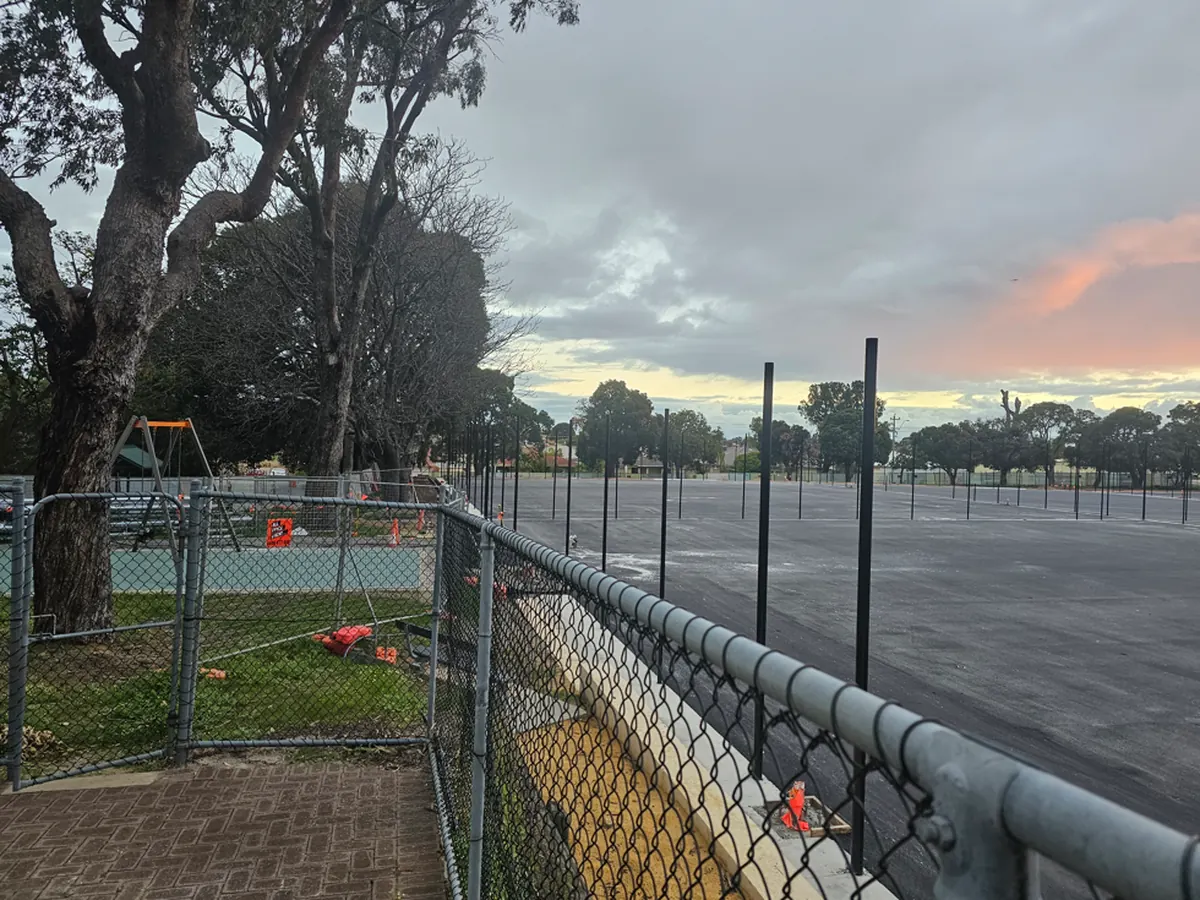 Resurfaced court area at Elliot Park viewed from the playground