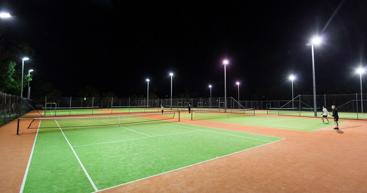 Doubles tennis under lights at Wanneroo Tennis Club
